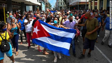 People take part in a demonstration to support the government of Cuban President Miguel Diaz-Canel in Havana, on July 11.