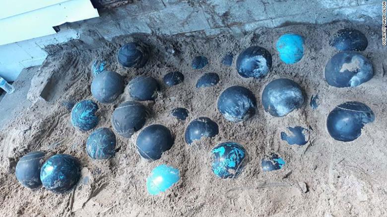 Home renovation leads to the discovery of over 150 bowling balls under a family's porch