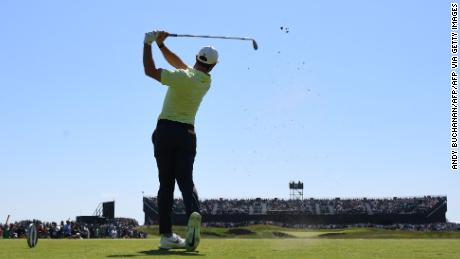 McIlroy tees off on the 16th during his second round of The Open.