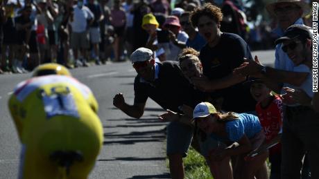 Spectators cheer on Pogacar during the 20th stage of the 108th edition of the Tour de France cycling race.