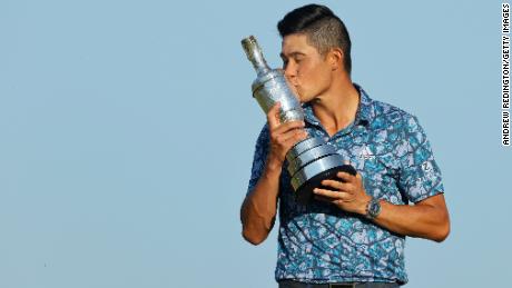 SANDWICH, ENGLAND - JULY 18: Open Champion, Collin Morikawa of United States kisses the Claret Jug on the 18th hole during Day Four of The 149th Open at Royal St George&#39;s Golf Club on July 18, 2021 in Sandwich, England. (Photo by Andrew Redington/Getty Images)