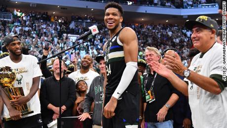 Giannis Antetokounmpo reacts after winning the NBA Finals.