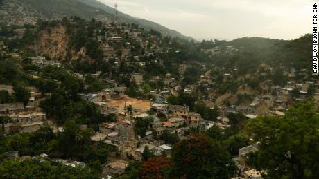 General view of homes and a soccer pitch in Port au Prince
