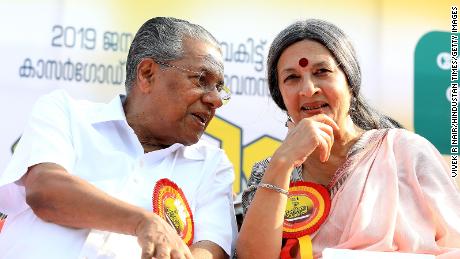 Chief Minister Pinarayi Vijayan with an activist during the &quot;Women&#39;s Wall&quot; protests in 2019.
