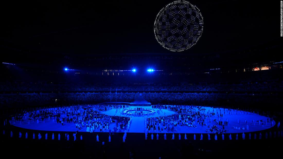 During one portion of the opening ceremony, there were 1,800 drones flying over the stadium to form a globe in the night sky. As the glowing drones soared over the stadium, performers sang &quot;Imagine&quot; by John Lennon.