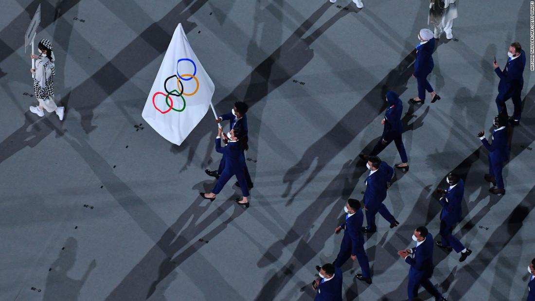 Members of the Refugee Olympic Team march during the parade of nations.