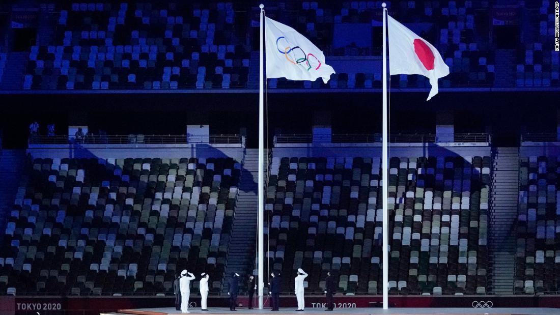 The Olympic flag is raised near the end of the opening ceremony.
