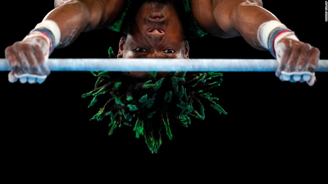 Nigerian gymnast Uche Eke competes on the horizontal bar on July 24.