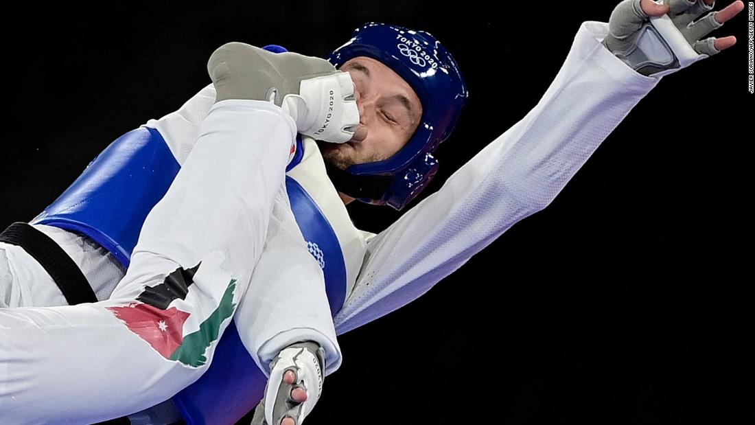 Norway&#39;s Richard Andre Ordemann is kicked in the face by Jordan&#39;s Saleh Elsharabaty during a taekwondo bout on July 26. Elsharabaty won 5-4.
