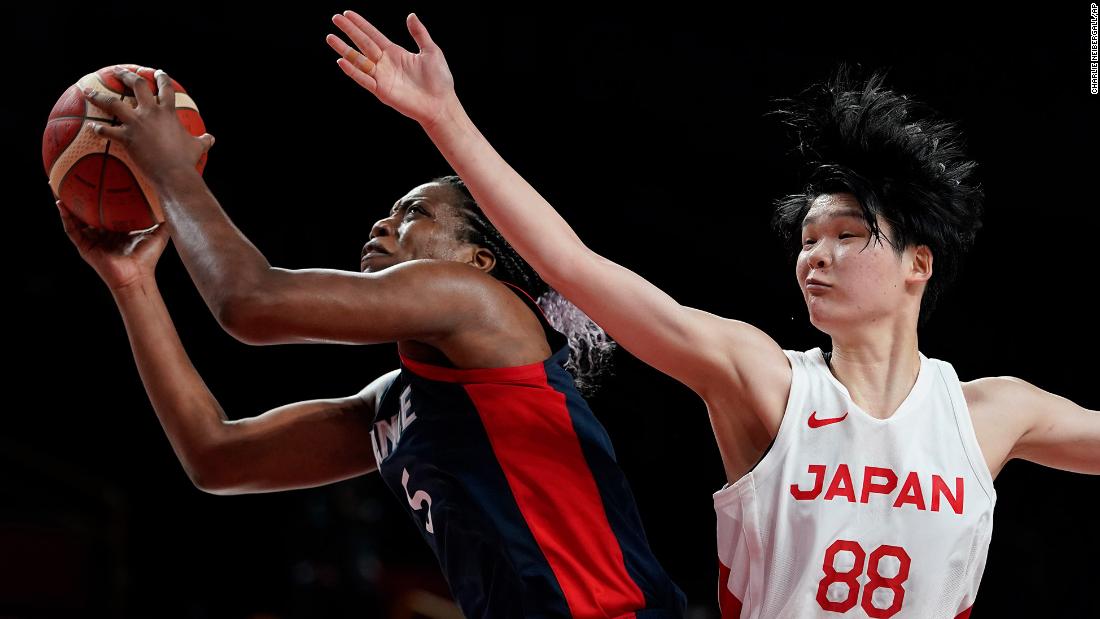 France&#39;s Endy Miyem is defended by Japan&#39;s Himawari Akaho during a basketball game on July 27. Japan defeated France 74-70.