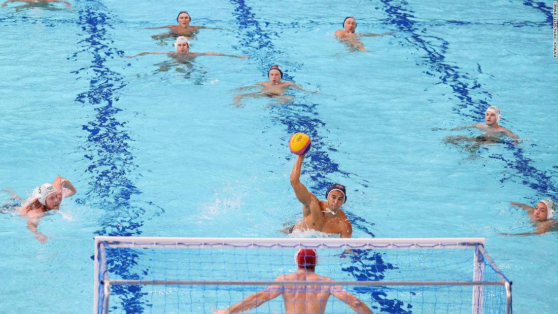 US water polo player Johnny Hooper takes a shot during the team&#39;s 20-3 win over South Africa on July 27.