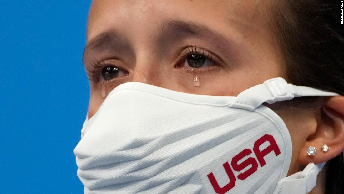 US diver Jessica Parratto cries after she and teammate Delaney Schnell won a silver medal in &lt;a href=&quot;https://www.cnn.com/world/live-news/tokyo-2020-olympics-07-27-21-spt/h_b02acea3373d34c2ca2446b234d2e4e4&quot; target=&quot;_blank&quot;&gt;the synchronized 10-meter platform event&lt;/a&gt; on July 27.