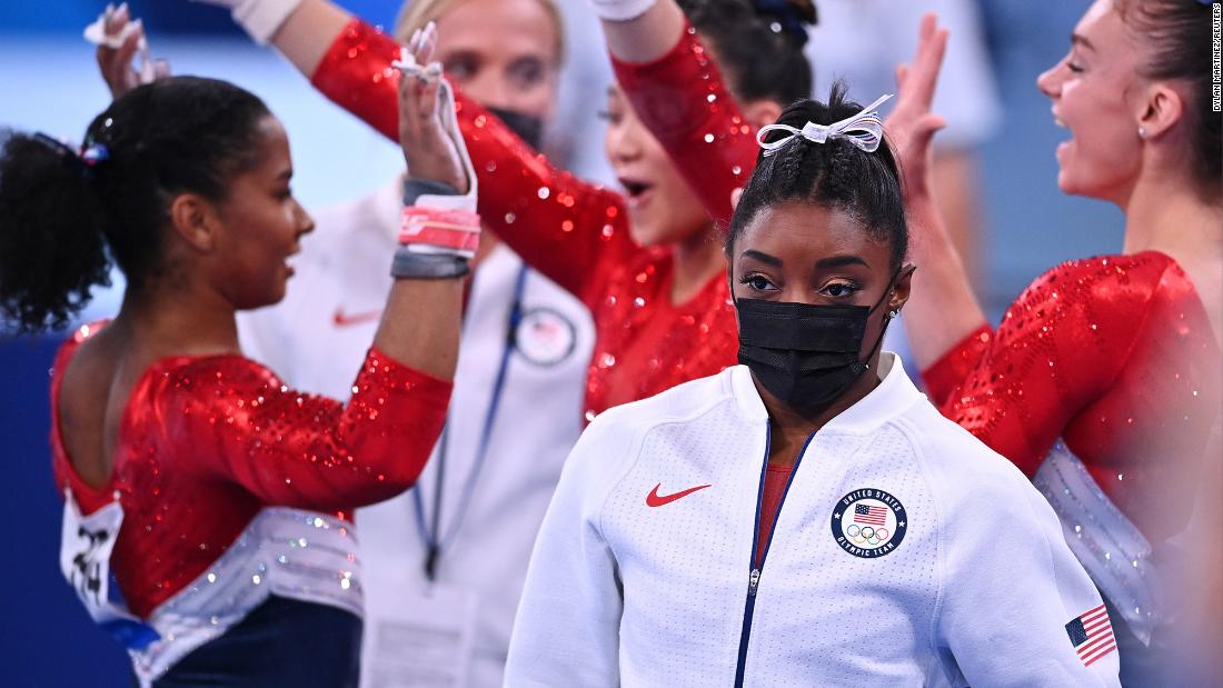 Biles wears her warm-up gear after she was pulled from the team all-around competition at the Tokyo Olympics on July 27. USA Gymnastics announced the next day that &lt;a href=&quot;https://edition.cnn.com/2021/07/28/sport/simone-biles-gymnastics-tokyo-2020-mental-health-spt-intl/index.html&quot; target=&quot;_blank&quot;&gt;Biles had also withdrawn from the individual all-around competition&lt;/a&gt; to focus on her mental health.