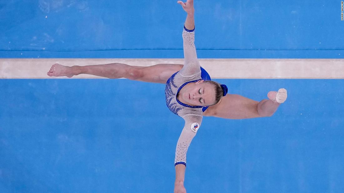 Russian gymnast Viktoria Listunova performs on the balance beam during the team all-around competition on July 27. She &lt;a href=&quot;https://www.cnn.com/world/live-news/tokyo-2020-olympics-07-27-21-spt/h_8916e07951f273460cfa89cee9100a9a&quot; target=&quot;_blank&quot;&gt;won the gold medal&lt;/a&gt; along with her teammates Vladislava Urazova, Angelina Melnikova and Lilia Akhaimova. Russian athletes at these Olympics are officially recognized as members of ROC, an abbreviation of the Russian Olympic Committee. That&#39;s because in 2019, the World Anti-Doping Agency &lt;a href=&quot;https://www.cnn.com/2021/07/26/sport/what-is-roc-olympics-explainer-spt-trnd/index.html&quot; target=&quot;_blank&quot;&gt;banned Russia&lt;/a&gt; from all international sporting competitions, including the Olympics, for doping non-compliance. Russian athletes can&#39;t compete under their country&#39;s name, flag and national anthem until December 2022.