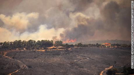 Wildfires scorch Spain and cause &#39;disaster without precedence&#39; in Sardinia