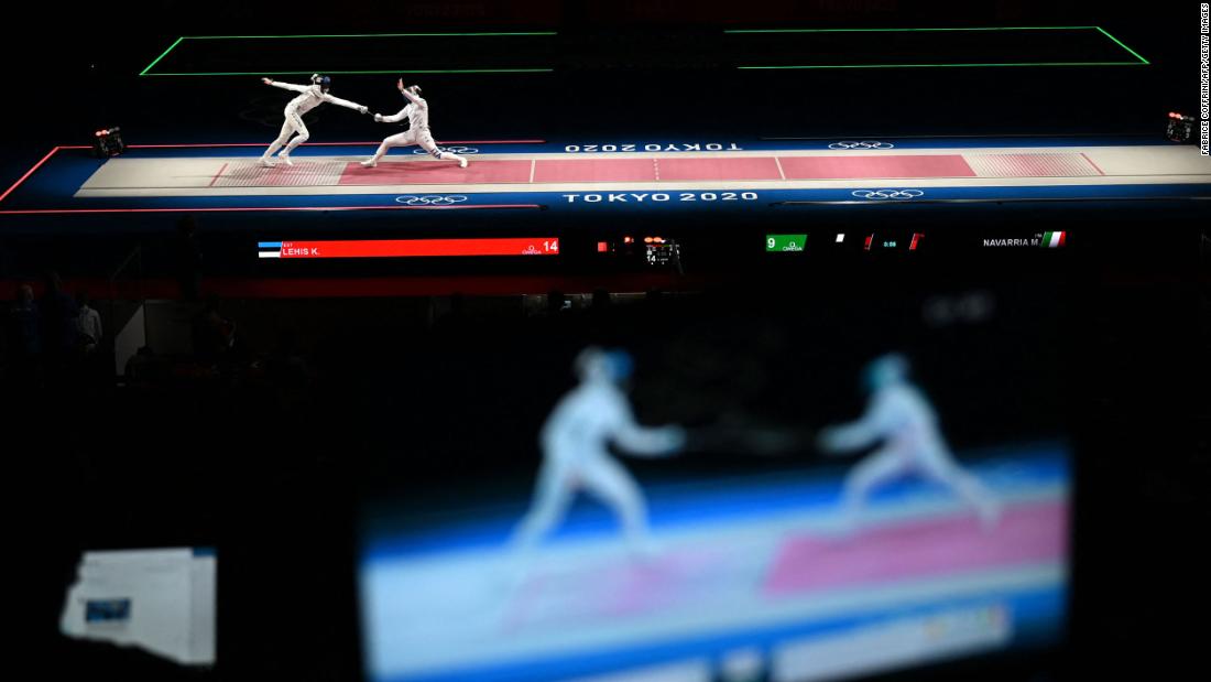 Estonian fencer Katrina Lehis, left, squares off against Italy&#39;s Mara Navarria in the team epée semifinals on July 27.
