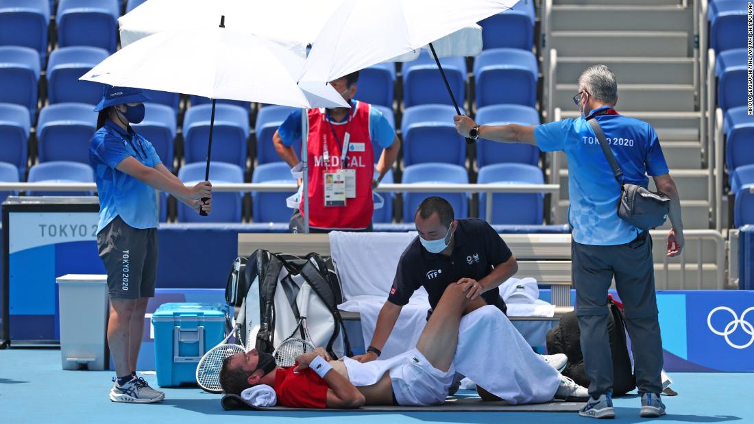 Russian tennis player Daniil Medvedev receives medical treatment during his third-round singles match on July 28. Midway through the match, the Russian — known for his dry humor and sarcasm — approached the chair umpire &lt;a href=&quot;https://www.cnn.com/world/live-news/tokyo-2020-olympics-07-28-21-spt/h_b0563c9d42927603e030f93c22bb2492&quot; target=&quot;_blank&quot;&gt;to ask what would happen if he died.&lt;/a&gt; Medvedev went on to win the match over Italy&#39;s Fabio Fognini.