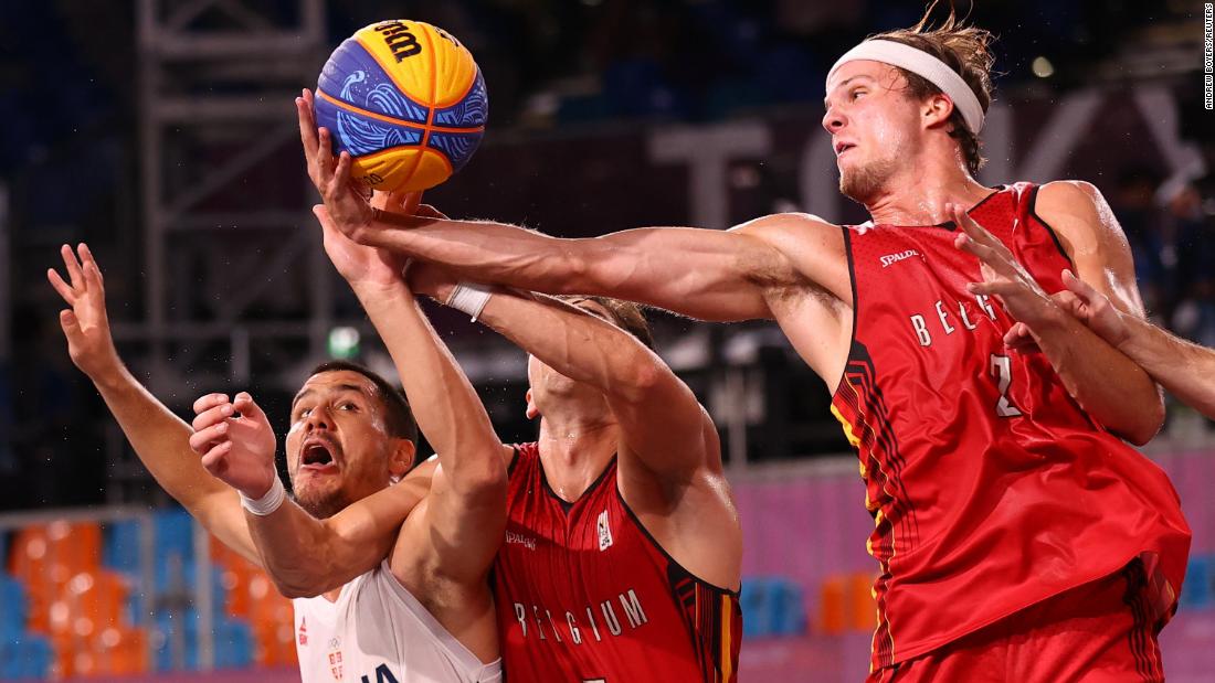 Serbia&#39;s Dusan Domovic Bulut, left, competes for the ball with Belgium&#39;s Rafael Bogaerts, center, and Thibaut Vervoort during a 3-on-3 basketball game on July 28. Serbia won the game for a bronze medal.