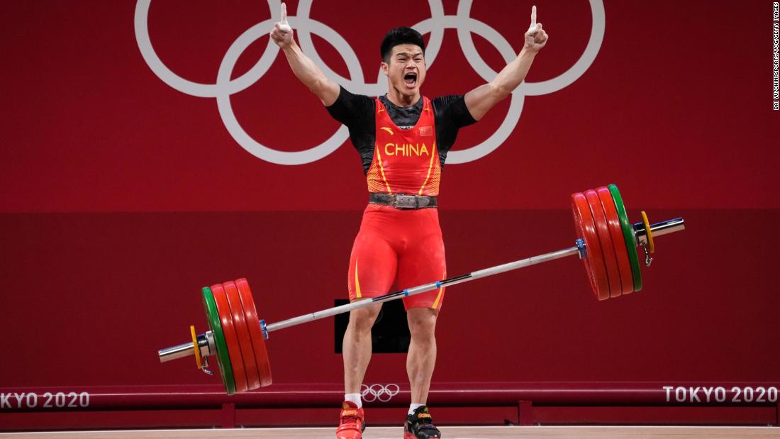 Chinese weightlifter Shi Zhiyong celebrates July 28 after winning gold in the 73-kilogram weight class. He lifted 166 kilograms in the snatch and 198 kilograms in the clean-and-jerk, setting &lt;a href=&quot;https://www.cnn.com/world/live-news/tokyo-2020-olympics-07-28-21-spt/h_377e9649c19957df713a660d039f1d4e&quot; target=&quot;_blank&quot;&gt;a new world record total of 364 kilograms.&lt;/a&gt;