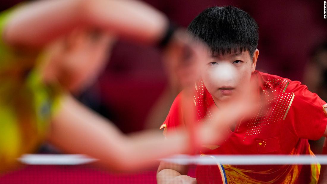 China&#39;s Sun Yingsha waits for a serve from Japan&#39;s Mima Ito during a table-tennis semifinal on July 29. Sun won to advance to the final.
