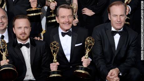 Aaron Paul, Bryan Cranston, and Bob Odenkirk, winners of Outstanding Drama Series for &quot;Breaking Bad,&quot; pose during the 66th Annual Primetime Emmy Awards on August 25, 2014. 