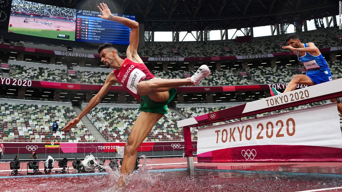 Morocco&#39;s Mohamed Tindouft falls while competing in the 3,000-meter steeplechase on July 30.