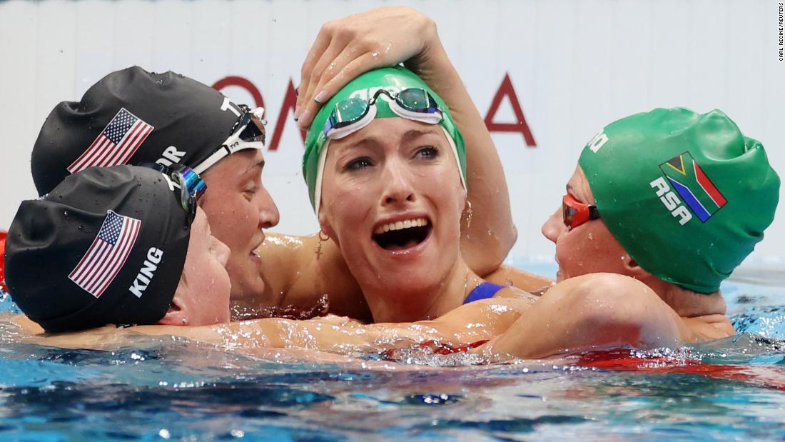 South African swimmer Tatjana Schoenmaker is congratulated by some of her fellow competitors — from left, American Lilly King, American Annie Lazor and South African Kaylene Corbett — after &lt;a href=&quot;https://www.cnn.com/world/live-news/tokyo-2020-olympics-07-29-21-spt/h_5fc36626ed162977a9a007f5febace8b&quot; target=&quot;_blank&quot;&gt;winning gold in the 200-meter breaststroke&lt;/a&gt; on July 30. She broke the world record, finishing with a time of 2:18.95.