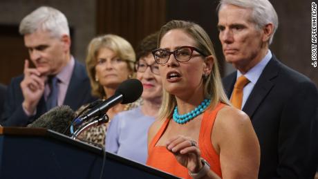 Sinema strikes big bipartisan infrastructure deal and suffers a Democratic backlash 
