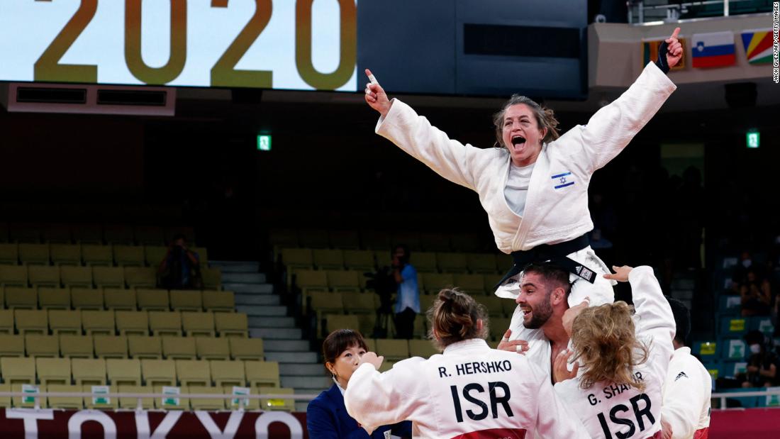 Team Israel celebrates winning the bronze in the judo mixed-team event on July 31. France won the gold and Japan won the silver.