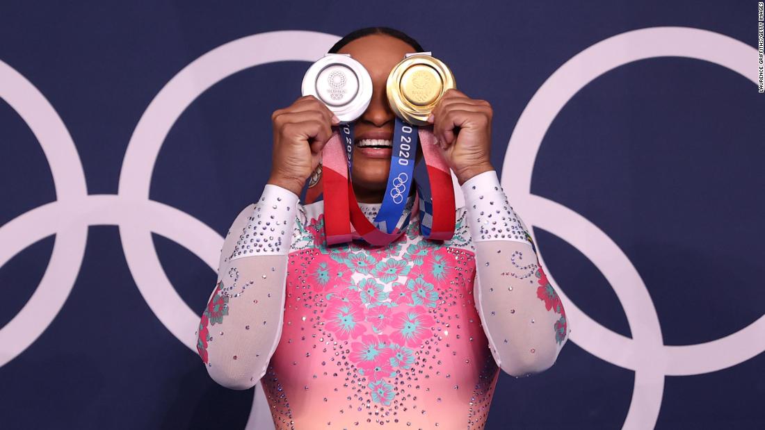 Brazilian gymnast Rebeca Andrade poses with her medals on August 2. During these Games, she won gold in the vault and silver in the individual all-around.