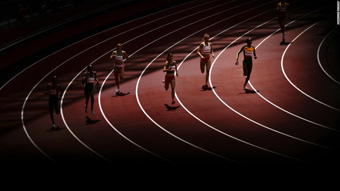 Athletes compete in a 400-meter heat on August 3.