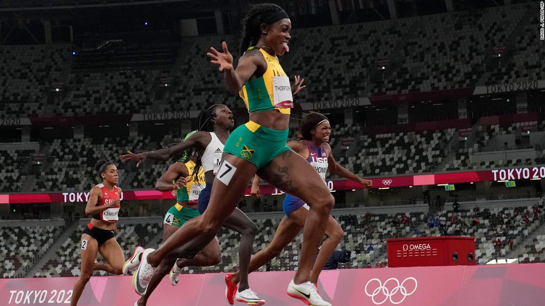 Jamaica&#39;s Elaine Thompson-Herah reacts &lt;a href=&quot;https://www.cnn.com/world/live-news/tokyo-2020-olympics-08-03-21-spt/h_bf3e0de4ba9674243fe29a8b449e5c1b&quot; target=&quot;_blank&quot;&gt;after defending her crown &lt;/a&gt;in the 200 meters on August 3. She also won gold in the 100 meters on Saturday. She&#39;s the first-ever woman to win the 100 and 200 double at consecutive Olympic Games.