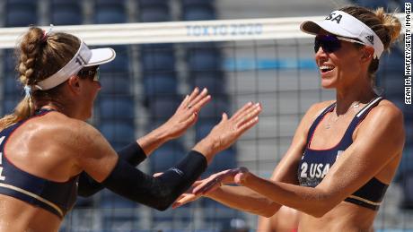 April Ross #1 of Team United States and Alix Klineman #2 celebrate after defeating Team Switzerland during the Women&#39;s Semifinal beach volleyball.