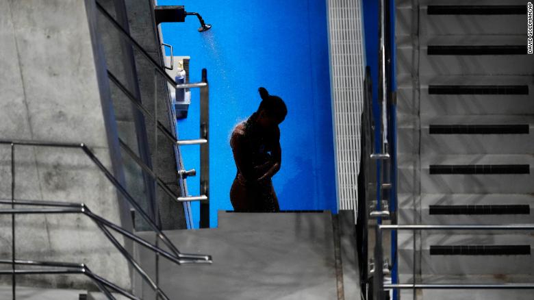 Why Olympic divers take showers -- and use those tiny towels -- between dives