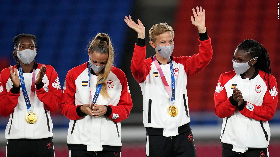 Canadian footballer Quinn waves during a medal ceremony in Yokohama, Japan. Quinn, who goes by just the one name, is &lt;a href=&quot;https://www.cnn.com/2021/08/05/sport/quinn-canada-sweden-spt-intl/index.html&quot; target=&quot;_blank&quot;&gt;the first trans and the first nonbinary athlete to win a Olympic medal.&lt;/a&gt;