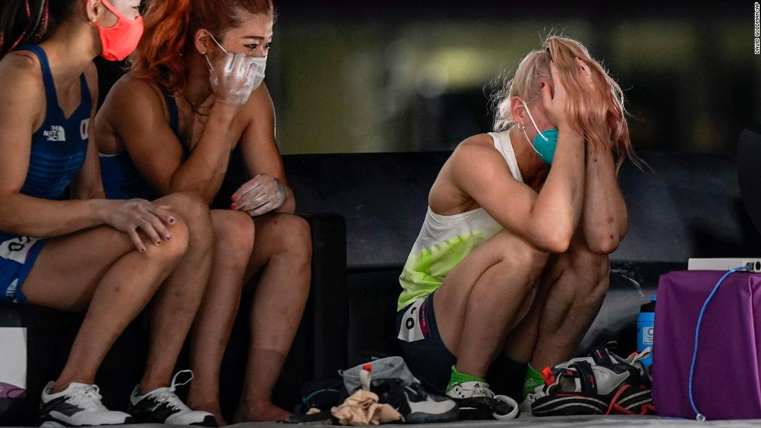 Slovenia&#39;s Janja Garnbret reacts after becoming &lt;a href=&quot;https://www.cnn.com/2021/08/06/sport/janja-garnbret-sports-climbing-tokyo-olympics-spt-intl/index.html&quot; target=&quot;_blank&quot;&gt;the first woman to win an Olympic gold medal in sport climbing &lt;/a&gt;on August 6. At left are bronze medalist Akiyo Noguchi and silver medalist Miho Nonaka, both of Japan.