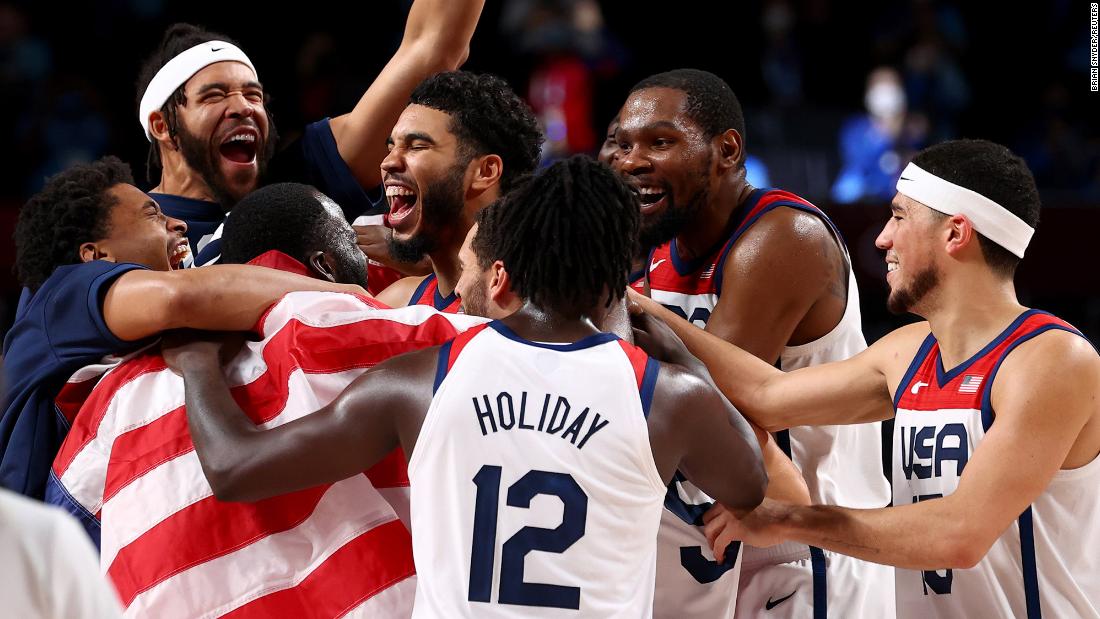 US basketball players celebrate after &lt;a href=&quot;https://www.cnn.com/world/live-news/tokyo-2020-olympics-08-07-21-spt/h_fbb5e6e6f9790e71f12c0994183a4819&quot; target=&quot;_blank&quot;&gt;defeating France 87-82 in the gold-medal game&lt;/a&gt; on August 7. It&#39;s the Americans&#39; fourth straight gold in men&#39;s basketball.