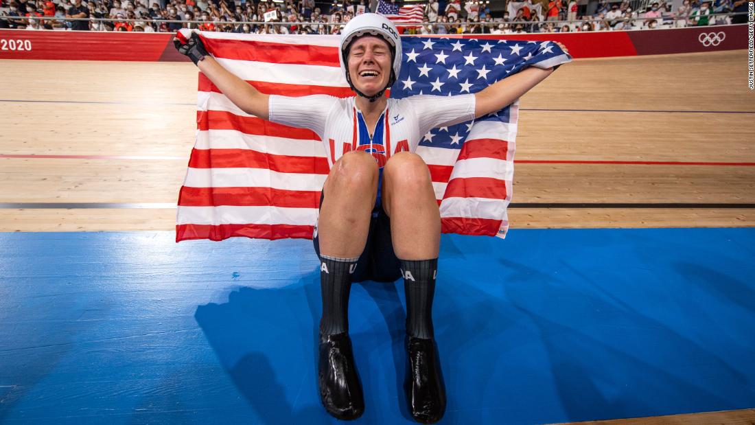Jennifer Valente holds the American flag after &lt;a href=&quot;https://www.cnn.com/world/live-news/tokyo-2020-olympics-08-08-21-spt/h_f7a98da2ab04c518550c14c7c1c9ac5e&quot; target=&quot;_blank&quot;&gt;winning gold at the Omnium track cycling event&lt;/a&gt; on August 8. It is the United States&#39; first gold medal in track cycling since 2000.