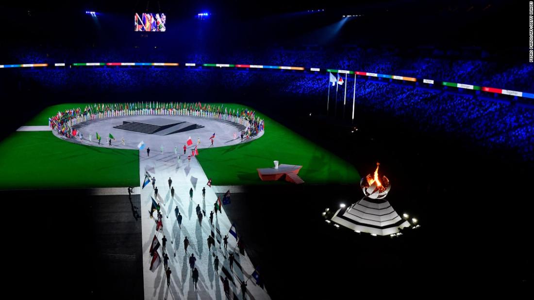 The flags of each participating nation are brought into the stadium for the closing ceremony.