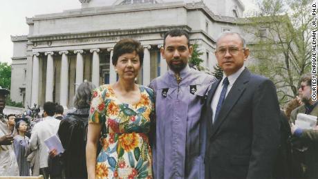 Enrique Alemán Jr., centrar, stands next to his parents Lupe and Enrique Alemán Sr. during his 1997 graduation from Columbia University in New York City.