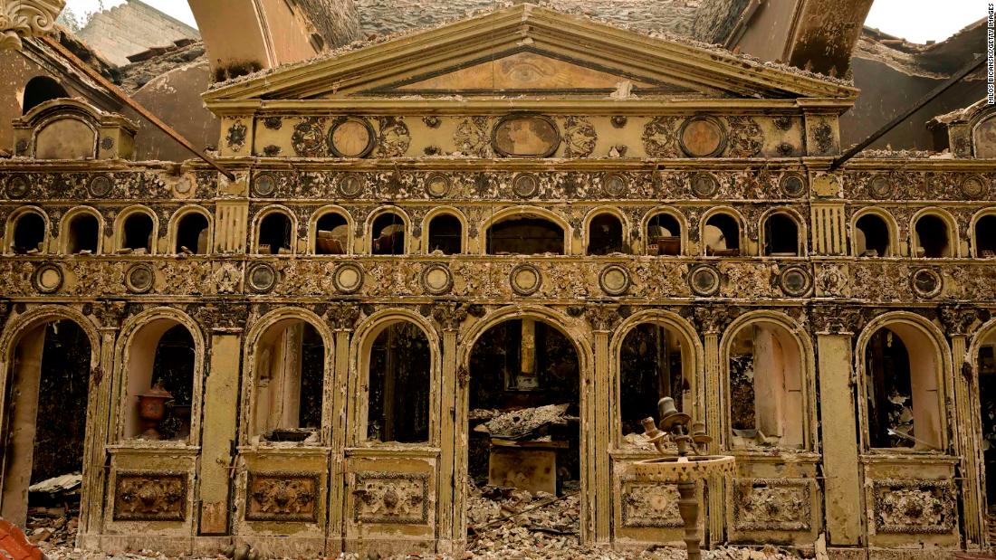 Remains of an 18th-century Orthodox church are seen on Tuesday, agosto 10, after a fire on the Greek island of Evia.