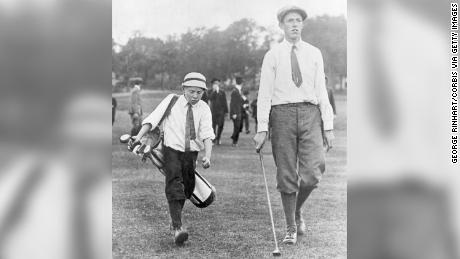 Francis Ouimet and his caddy, Eddie Lowery, play golf at Brookline in 1913.