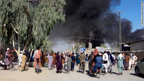 Smoke rises after fighting between the Taliban and Afghan security personnel in Kandahar on Thursday.