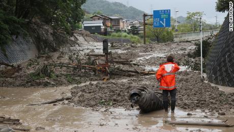 A landslide triggered by a torrential rain covers a road in Otsu, Shiga Prefecture on Saturday.