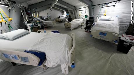Five intensive care beds, part of the 32-bed Samaritan&#39;s Purse Emergency Field Hospital, are set up in a parking garage in Jackson, Miss. 