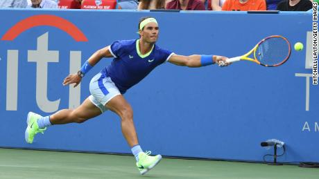 Nadal tries to return a shot during his match against Lloyd Harris at the Citi Open.
