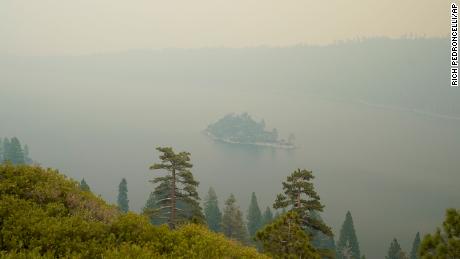 Lake Tahoe&#39;s Emerald Bay is shrouded in smoke from the Caldor Fire, near South Lake Tahoe, California, August 24, 2021.