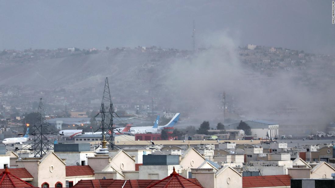 Smoke rises from the explosion outside the airport in Kabul on August 26.