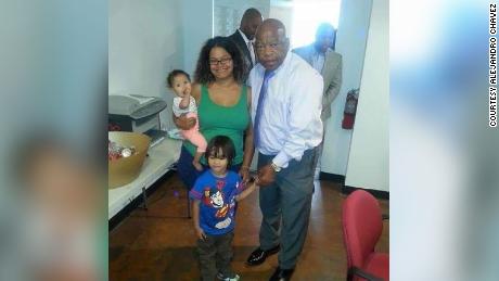 Alejandro Chavez&#39;s wife, Natacha, and children, Alejandro and Amelia, meet John Lewis in 2014. 