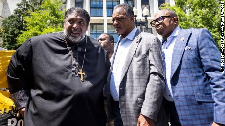 Mandatory Credit: Photo by JIM LO SCALZO/EPA-EFE/Shutterstock (12166650h)
Political activists Reverend William J. Barber II (L) and Reverend Jesse Jackson (C) speak prior to being detained outside the Hart Senate Office Building for obstructing traffic during a &#39;Moral March on Manchin and McConnell&#39; in Washington, DC, USA, 23 June 2021.
Manchin, McConnell Protest in DC, Washington, USA - 23 Jun 2021